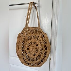 Handcrafted tan woven beach bag